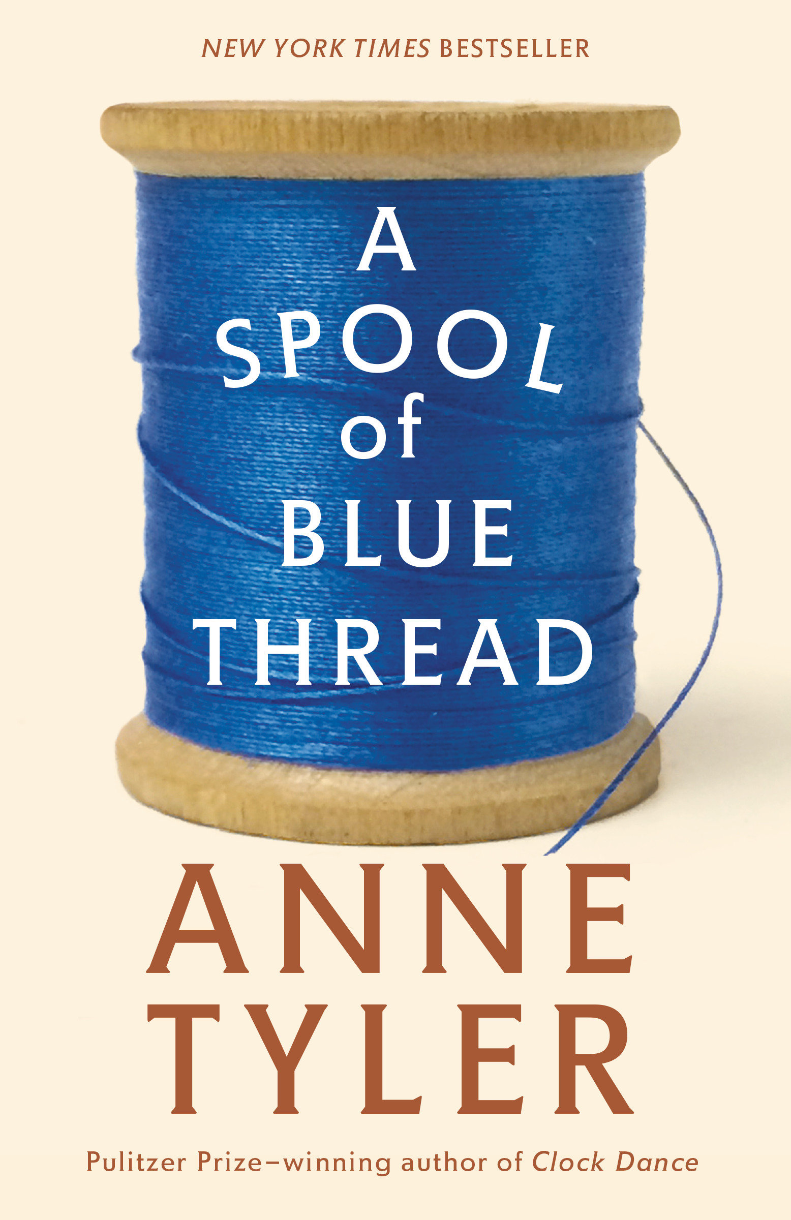 A spool of blue thread cover image